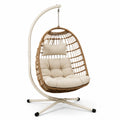 Sedia a dondolo sospesa in rattan sintetico con cuscino beige