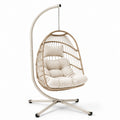 Sedia sospesa in rattan sintetico con cuscino in poliestere e struttura in acciaio