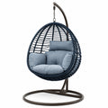 Poltrona sospesa in rattan blu con cuscini